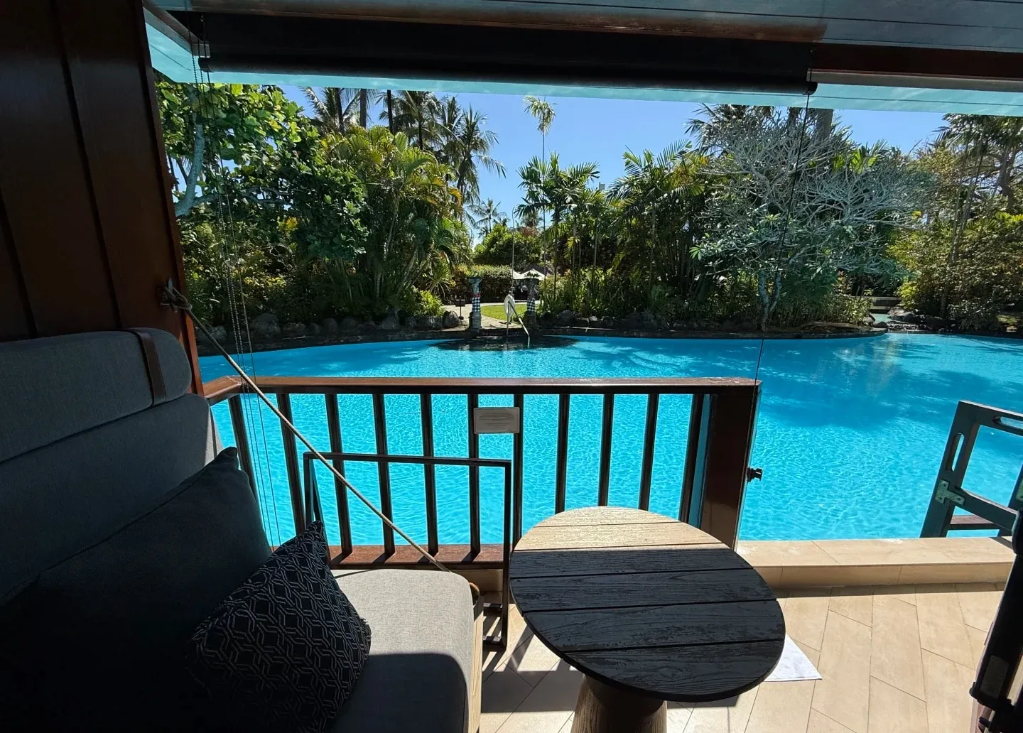 A Lagoon Access terrace with a gate opening straight onto the lagoon pool